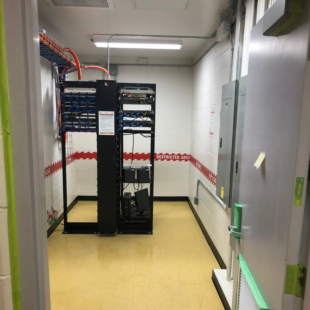 Structured cabling data rack build-out in a communications room