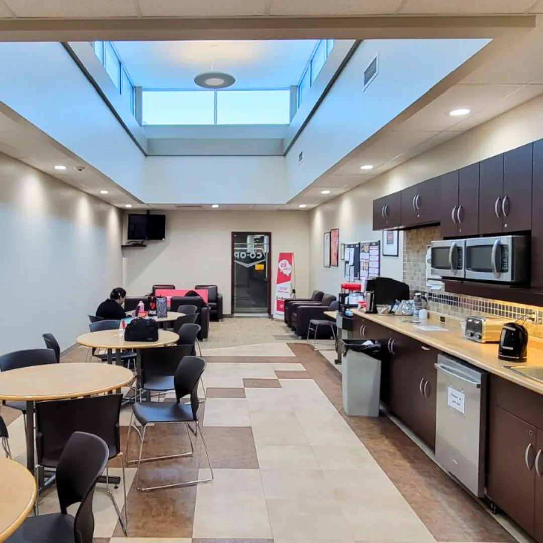 Commercial office breakroom electrical fit-out with skylight and under-cabinet lighting